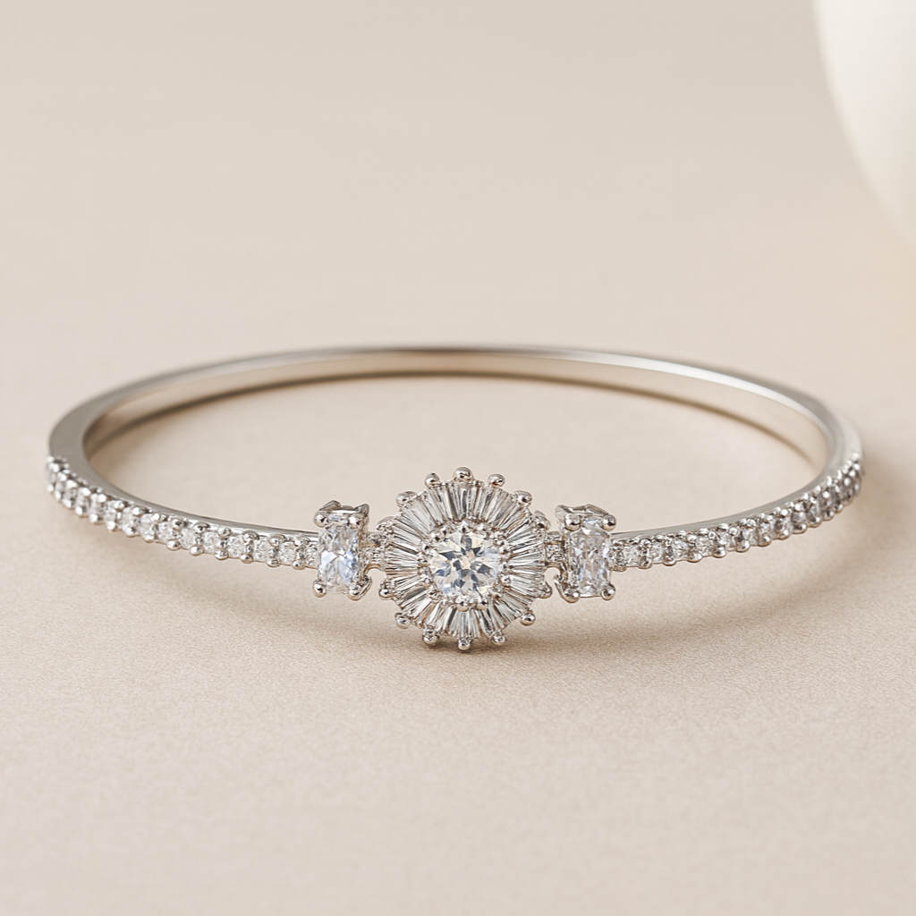 Silver bracelet with diamond accents on a beige background