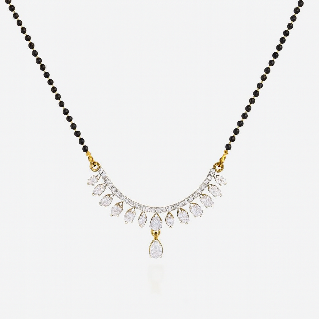 Necklace with black beads and a gold and diamond pendant on a white background