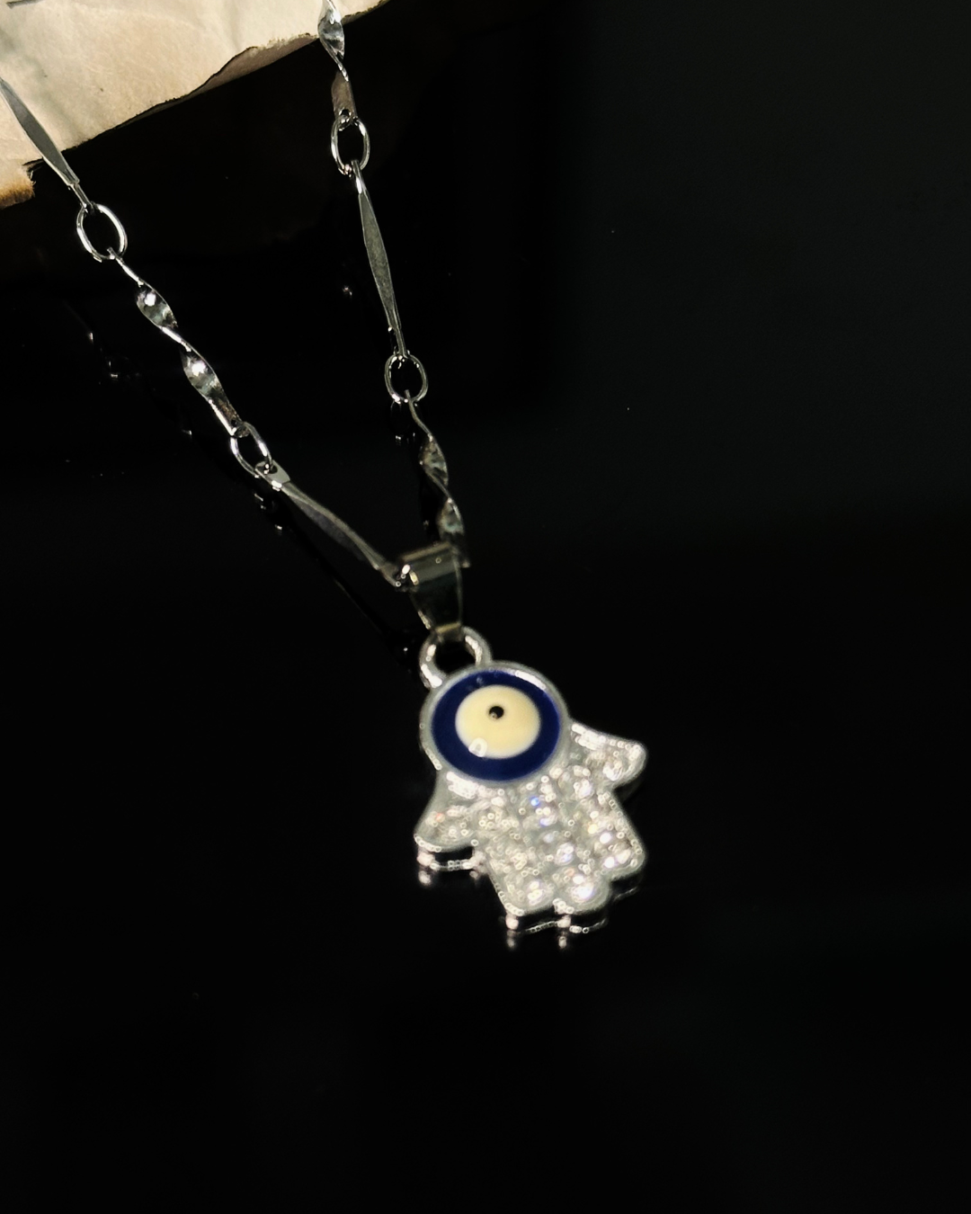 silver plated evil eye pendant
